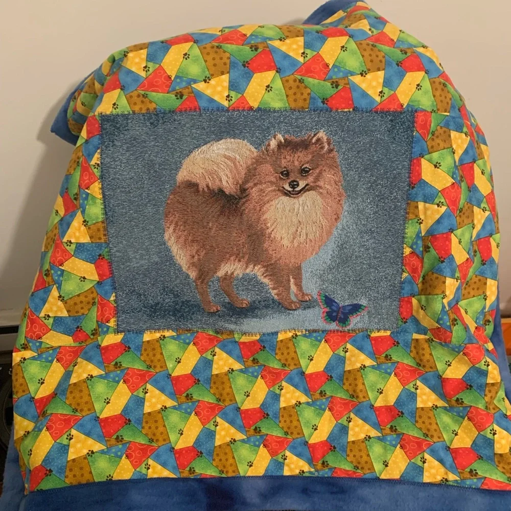 Pomeranian baby blanket. Or can use as a tapestry. Also dog blanket.